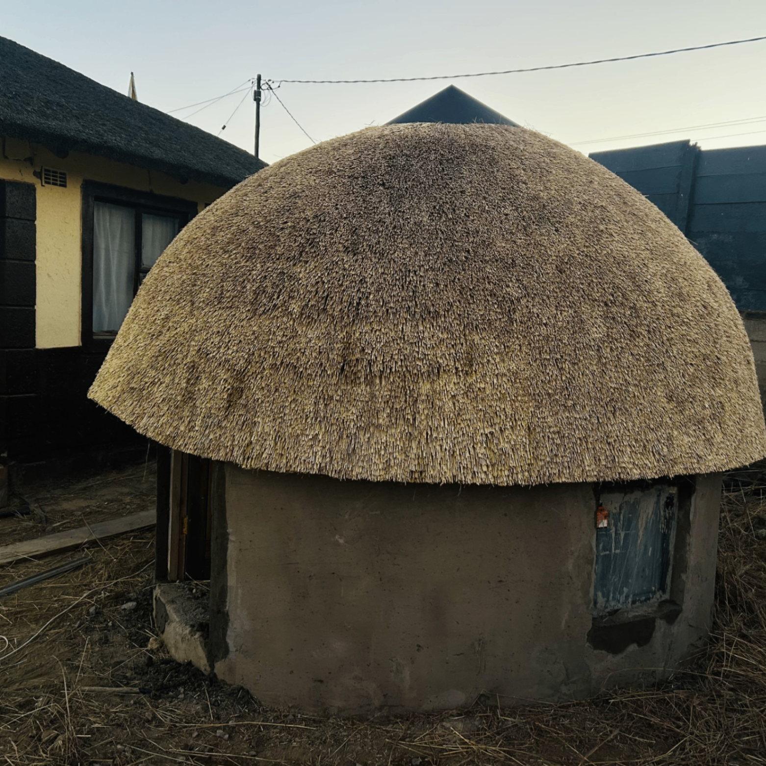 Dome-shaped thatch roof on round hut